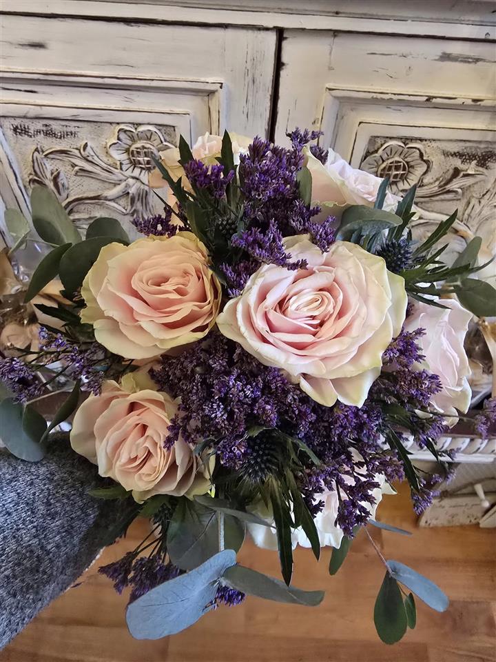 Reception centrepieces by Flowers By Joan