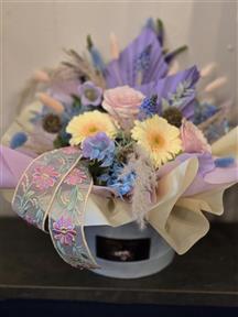 Elegant flower arrangement by Flowers by Joan