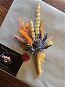 Groom and groomsmen buttonholes by Flowers by Joan